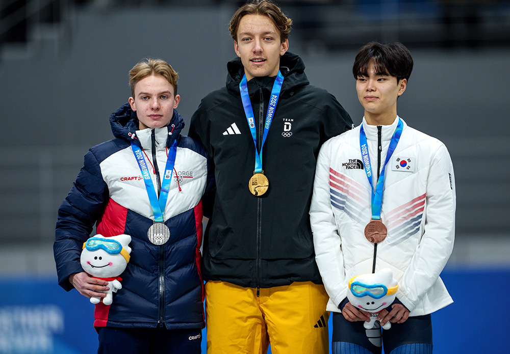 Gold medalist Finn Sonnekalb (GER), silver medallist Miika Johan Klevstuen (NOR), and bronze medalist Shin Seonung (KOR) on the podium for the Medal Ceremony of the Speed Skating Men’s 500m at the Gangneung Oval o