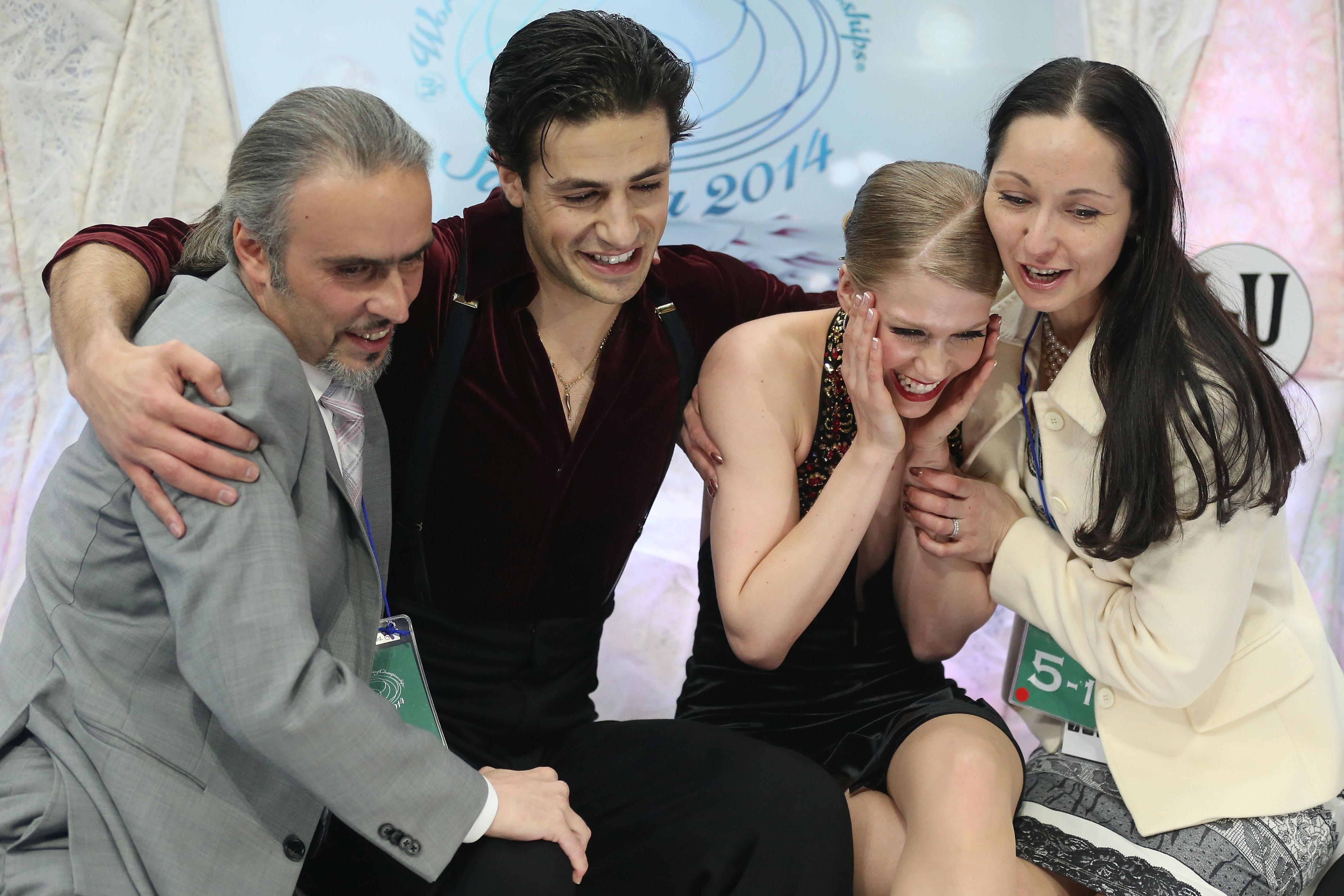 WFSC JPN Coach Pasquale Camerlengo, skaters Andrew Poje and Kaitlyn Weaver (CAN) and coach Anjelika Krylova 2014©Getty Images 481242277
