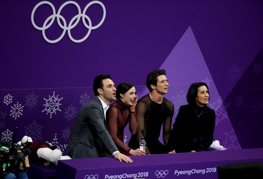 WOG KOR Tessa Virtue and Scott Moir (CAN) and coaches Marie France Dubreuil and Patrice Lauzon2018©Getty Images 921167786 (1)