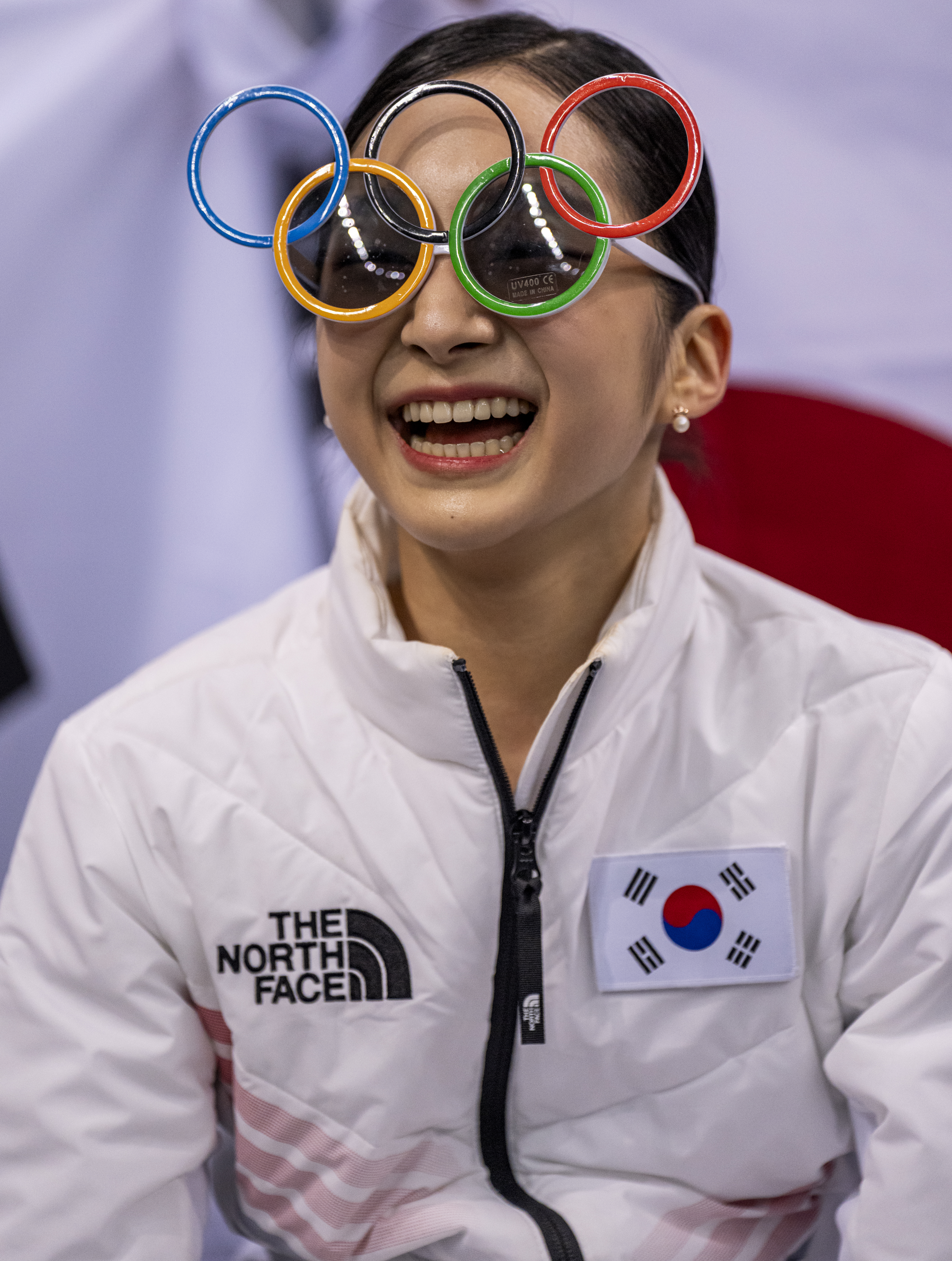 Shin Jia (KOR) celebrates in the Kiss and Cry after winning the Figure Skating Team Event