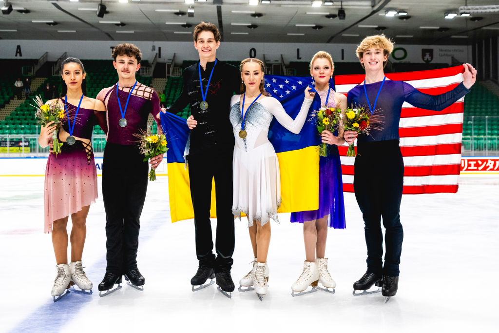 Iryna Pidgaina and Artem Koval (UKR) silver medal winners Celina Fradji and Jean Hans Fourneaux (FRA) and bronze medal winners Caroline Mullen and Brendan Mullen (USA) Junior Grand Prix GettyImages 2176065477