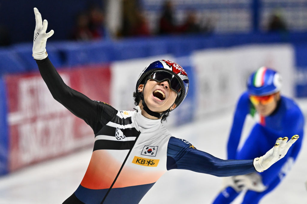 Kim Gun Woo (KOR) celebrates as he finishes first in the men's 1500m final