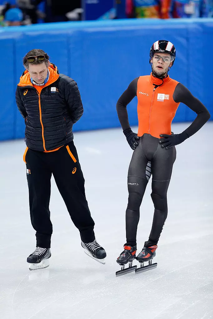 Sjinkie Knegt (NED) with coach Jeroen Otter WOG 2014©Getty Images 466895927