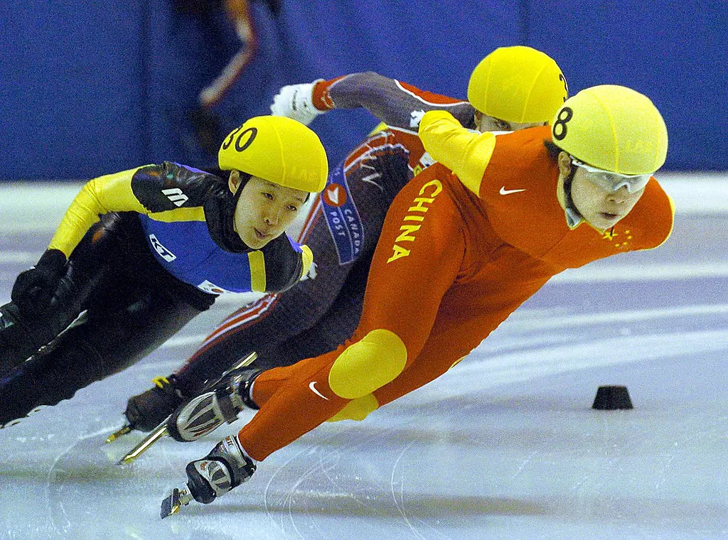 Wang Meng (CHN) Kim Yun Mi (KOR)  Short Track Speed Skating Team Championship 2005 Chuncheon (KOR) GettyImages 52282621